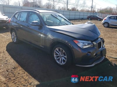 Czwarte zdjęcie samochodu z boku: 2015 BMW X1 XDRIVE28I VIN:WBAVL1C5XFVY33582 - miniatura