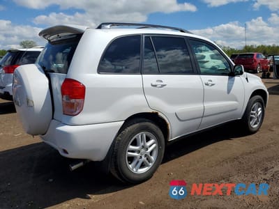 Trzecie zdjęcie samochodu z tyłu: 2002 TOYOTA RAV4 BASE VIN:JTEGH20V520058280 - miniatura