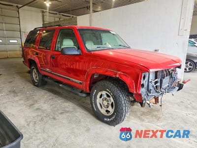 Czwarte zdjęcie samochodu z boku: 2000 CHEVROLET TAHOE K1500 VIN:1GNEK13R4YR102903 - miniatura