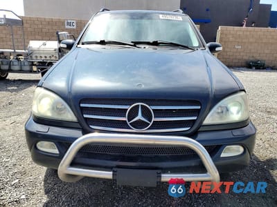 Piąte zdjęcie samochodu w środku: 2002 MERCEDES-BENZ ML 500 VIN:4JGAB75E92A323547 - miniatura