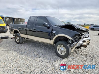 Czwarte zdjęcie samochodu z boku: 2000 FORD F150 VIN:1FTRX18L5YKA03421 - miniatura