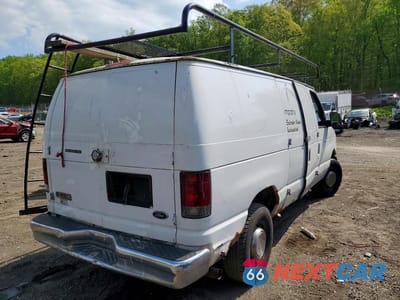 Trzecie zdjęcie samochodu z tyłu: 2006 FORD ECONOLINE E350 SUPER DUTY VAN VIN:1FTSE34L86DA80018 - miniatura