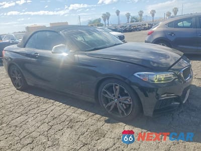 Czwarte zdjęcie samochodu z boku: 2016 BMW M235I VIN:WBA1M1C50GV394695 - miniatura