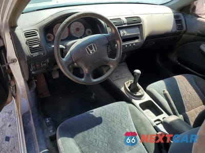 Zdjęcie 8 z 12 samochodu: 2002 HONDA CIVIC LX VIN:1HGEM21562L002919 - miniatura