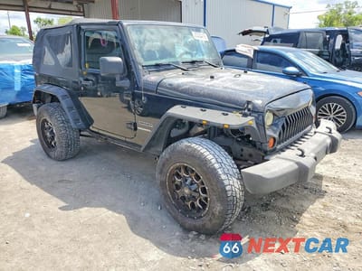 Czwarte zdjęcie samochodu z boku: 2013 JEEP WRANGLER SPORT VIN:1C4AJWAG6DL553899 - miniatura