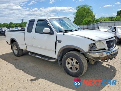 Czwarte zdjęcie samochodu z boku: 2002 FORD F150 VIN:1FTRX18W62NA55852 - miniatura