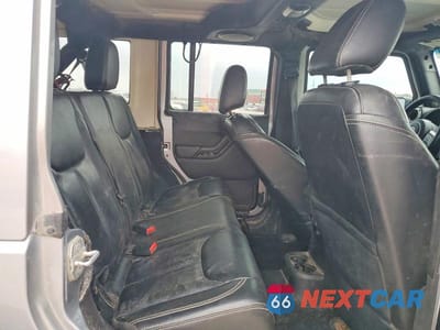 Zdjęcie 11 z 13 samochodu: 2014 JEEP WRANGLER UNLIMITED SAHARA VIN:1C4BJWEG7EL296431 - miniatura