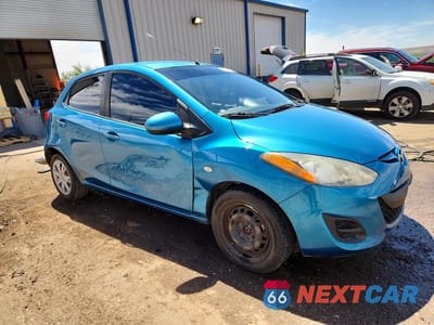 Czwarte zdjęcie samochodu z boku: 2012 MAZDA MAZDA2 VIN:JM1DE1KY3C0144688 - miniatura
