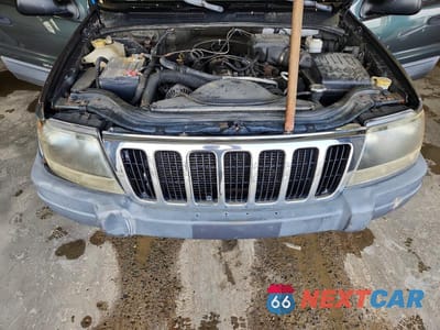 Zdjęcie 12 z 13 samochodu: 2002 JEEP GRAND CHEROKEE LAREDO VIN:1J4GW48SX2C232806 - miniatura