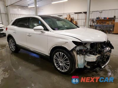 Czwarte zdjęcie samochodu z boku: 2016 LINCOLN MKX RESERVE VIN:2LMTJ8LR3GBL77529 - miniatura