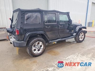 Trzecie zdjęcie samochodu z tyłu: 2015 JEEP WRANGLER UNLIMITED SAHARA VIN:1C4HJWEG6FL528447 - miniatura