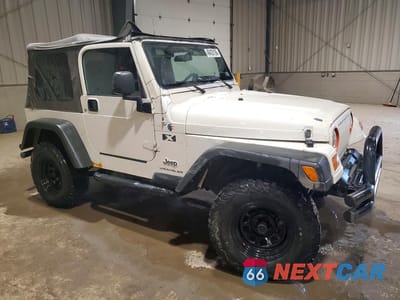 Czwarte zdjęcie samochodu z boku: 2003 JEEP WRANGLER COMMANDO VIN:1J4FA39S63P311192 - miniatura