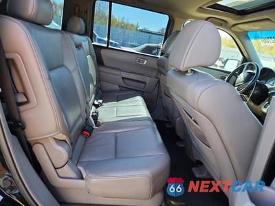 Zdjęcie 11 z 13 samochodu: 2009 HONDA PILOT EXL VIN:5FNYF48589B041791 - miniatura