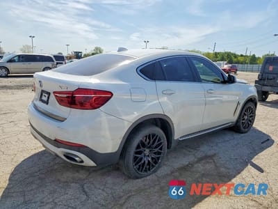 Trzecie zdjęcie samochodu z tyłu: 2015 BMW X6 XDRIVE50I VIN:5UXKU6C5XF0F94310 - miniatura