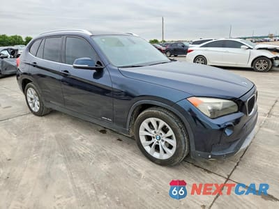 Czwarte zdjęcie samochodu z boku: 2014 BMW X1 XDRIVE28I VIN:WBAVL1C57EVY17810 - miniatura