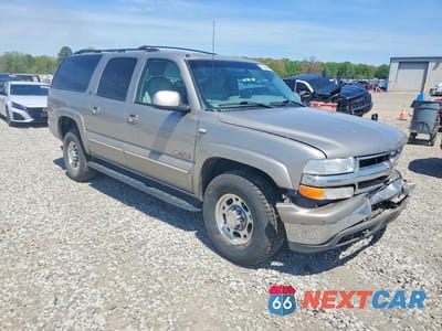 Czwarte zdjęcie samochodu z boku: 2000 CHEVROLET SUBURBAN K2500 VIN:3GNGK26U3YG183634 - miniatura