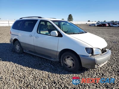 Czwarte zdjęcie samochodu z boku: 2002 TOYOTA SIENNA XLE VIN:4T3ZF13C82U444386 - miniatura