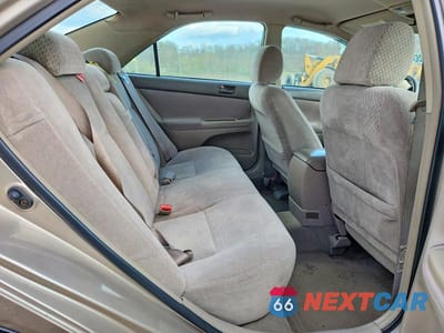 Zdjęcie 10 z 11 samochodu: 2003 TOYOTA CAMRY LE VIN:4T1BE32K33U674212 - miniatura