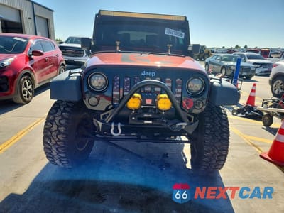 Piąte zdjęcie samochodu w środku: 2009 JEEP WRANGLER X VIN:1J4FA24169L719734 - miniatura