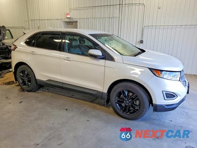 Czwarte zdjęcie samochodu z boku: 2016 FORD EDGE SEL VIN:2FMPK4J87GBC37318 - miniatura