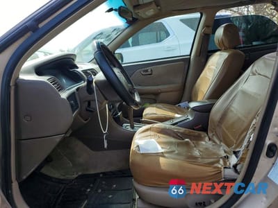 Zdjęcie 7 z 12 samochodu: 2001 TOYOTA CAMRY LE VIN:4T1BG22K21U810959 - miniatura
