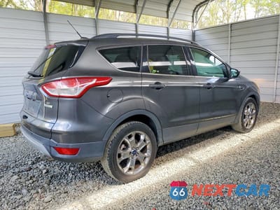 Trzecie zdjęcie samochodu z tyłu: 2015 FORD ESCAPE SE VIN:1FMCU0GX0FUC20739 - miniatura