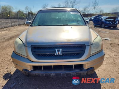 Piąte zdjęcie samochodu w środku: 2005 HONDA PILOT EXL VIN:5FNYF18555B048917 - miniatura