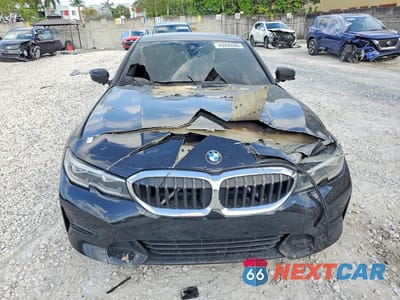 Piąte zdjęcie samochodu w środku: 2020 BMW 330I VIN:3MW5R1J05L8B13644 - miniatura