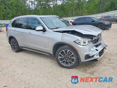 Czwarte zdjęcie samochodu z boku: 2018 BMW X5 XDR40E VIN:5UXKT0C59J0V98063 - miniatura