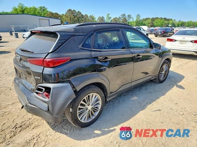 Trzecie zdjęcie samochodu z tyłu: 2018 HYUNDAI KONA SEL VIN:KM8K6CAA7JU104300 - miniatura