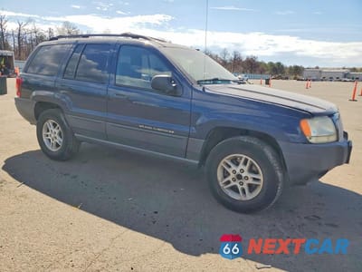 Czwarte zdjęcie samochodu z boku: 2004 JEEP GRAND CHEROKEE LAREDO VIN:1J4GW48S34C280988 - miniatura