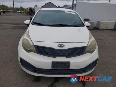 Piąte zdjęcie samochodu w środku: 2013 KIA RIO LX VIN:KNADM4A35D6280150 - miniatura
