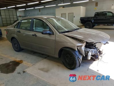 Czwarte zdjęcie samochodu z boku: 2005 FORD FOCUS ZX4 VIN:1FAFP34NX5W272613 - miniatura