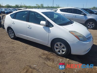 Czwarte zdjęcie samochodu z boku: 2004 TOYOTA PRIUS BASE VIN:JTDKB20U540095937 - miniatura
