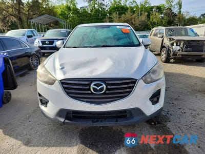 Piąte zdjęcie samochodu w środku: 2016 MAZDA CX-5 TOURING VIN:JM3KE4CY9G0760755 - miniatura