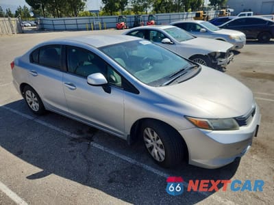 Czwarte zdjęcie samochodu z boku: 2012 HONDA CIVIC LX VIN:2HGFB2F55CH563310 - miniatura
