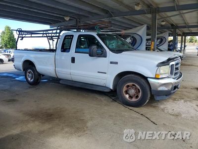 Czwarte zdjęcie samochodu z boku: 2002 FORD F250 SUPER DUTY VIN:1FTNX20F92EA94497 - miniatura