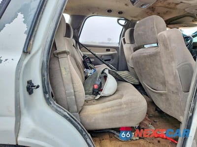Zdjęcie 11 z 12 samochodu: 2002 CHEVROLET TAHOE C1500 VIN:1GNEC13V62J340235 - miniatura