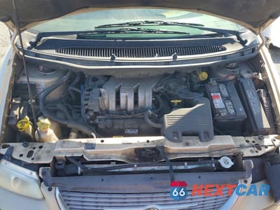 Zdjęcie 12 z 13 samochodu: 1999 CHRYSLER TOWN & COUNTRY SX VIN:1C4GP55L6XB519241 - miniatura