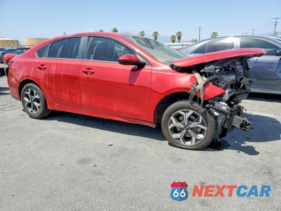 Czwarte zdjęcie samochodu z boku: 2019 KIA FORTE LXS VIN:3KPF24AD8KE120216 - miniatura