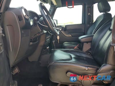 Zdjęcie 7 z 13 samochodu: 2014 JEEP WRANGLER UNLIMITED SAHARA VIN:1C4HJWEG0EL271977 - miniatura