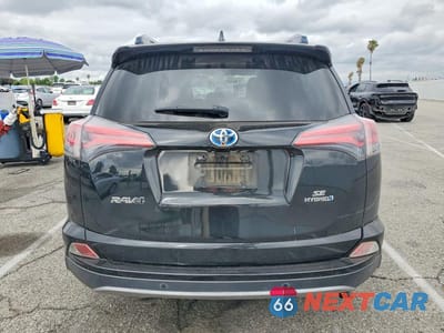 Zdjęcie 6 z 13 samochodu: 2018 TOYOTA RAV4 HV SE VIN:JTMJJREV9JD199442 - miniatura