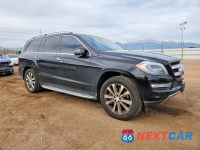 Czwarte zdjęcie samochodu z boku: 2013 MERCEDES-BENZ GL 450 4MATIC VIN:4JGDF7CE4DA255942 - miniatura