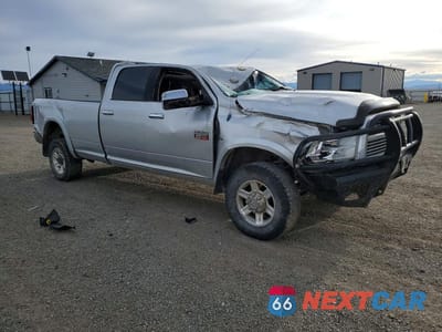 Czwarte zdjęcie samochodu z boku: 2012 DODGE RAM 3500 LARAMIE VIN:3C63D3JL4CG262249 - miniatura