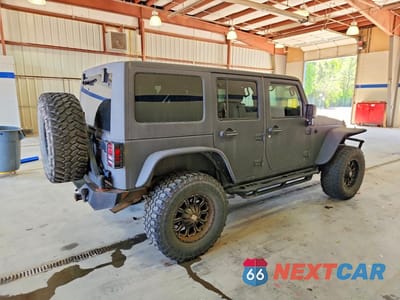Trzecie zdjęcie samochodu z tyłu: 2013 JEEP WRANGLER UNLIMITED SPORT VIN:1C4BJWDG1DL506005 - miniatura