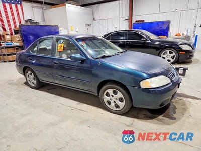 Czwarte zdjęcie samochodu z boku: 2003 NISSAN SENTRA XE VIN:3N1CB51DX3L817668 - miniatura