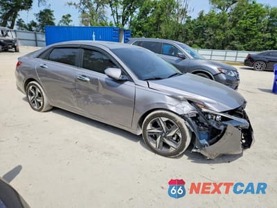 Czwarte zdjęcie samochodu z boku: 2021 HYUNDAI ELANTRA SEL VIN:KMHLN4AGXMU140312 - miniatura
