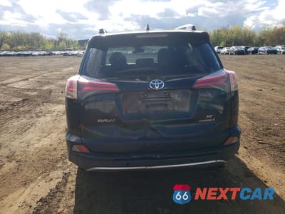 Zdjęcie 6 z 12 samochodu: 2017 TOYOTA RAV4 HV SE VIN:JTMJJREV0HD087400 - miniatura