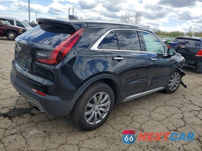 Trzecie zdjęcie samochodu z tyłu: 2019 CADILLAC XT4 PREMIUM LUXURY VIN:1GYFZCR49KF219556 - miniatura