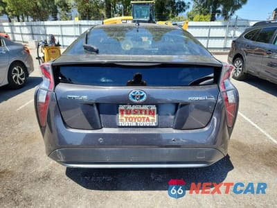 Zdjęcie 6 z 13 samochodu: 2018 TOYOTA PRIUS TWO VIN:JTDKBRFUXJ3585851 - miniatura